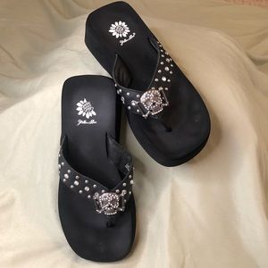 yellow box skull flip flops